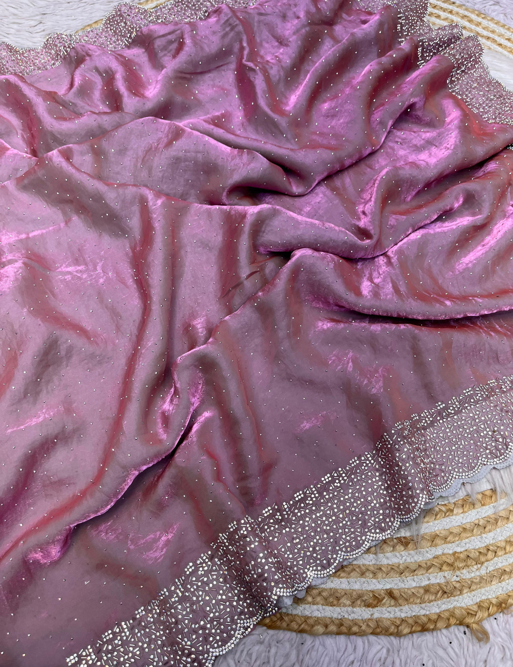 Dazzle in this stunning pink stone saree, perfect for making a statement at any occasion !!